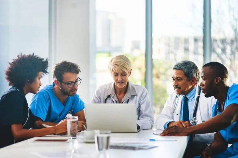 A group of mental health professionals discussing mental health services A group of mental health professionals discussing mental health services