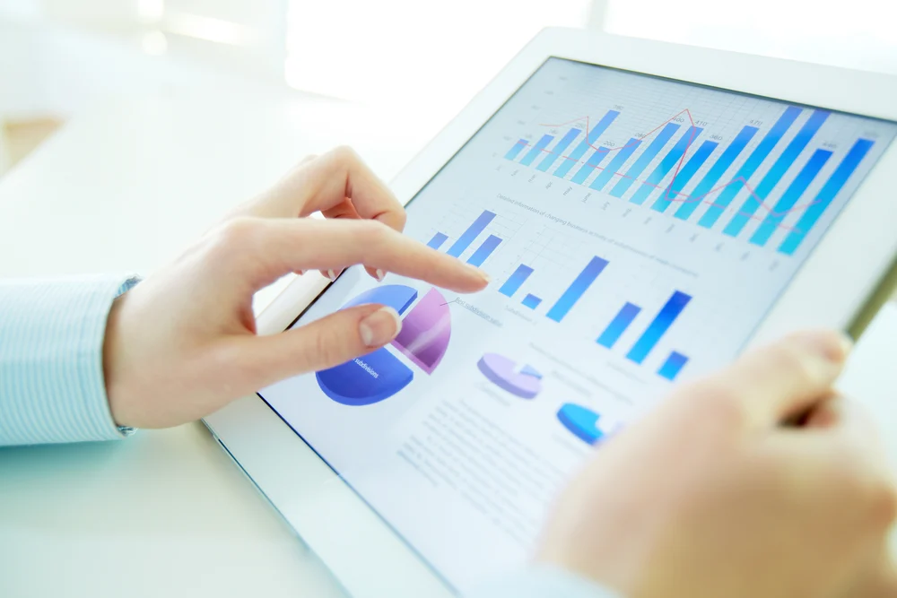 data analysis person checking data analytics for mental health marketing